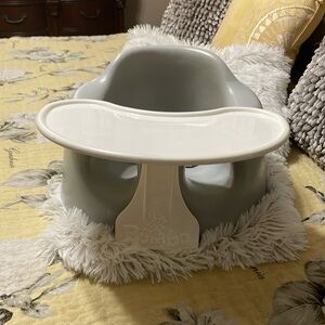 Toddlers Bumbo seat with attachable tray